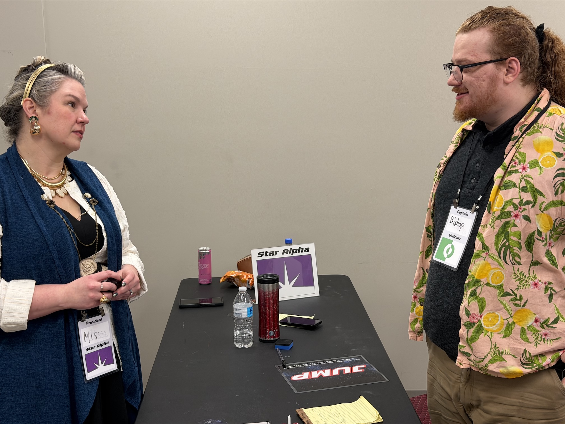 The President confers with the Vulcan's captain