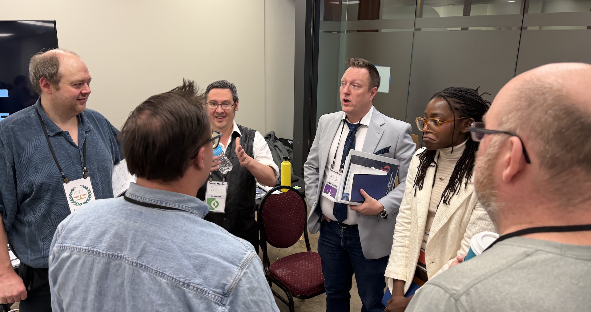 Council members gather between sessions